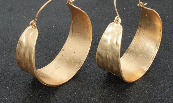 Large Gold Culture Earrings.