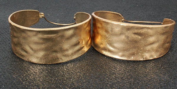 Large Gold Culture Earrings.